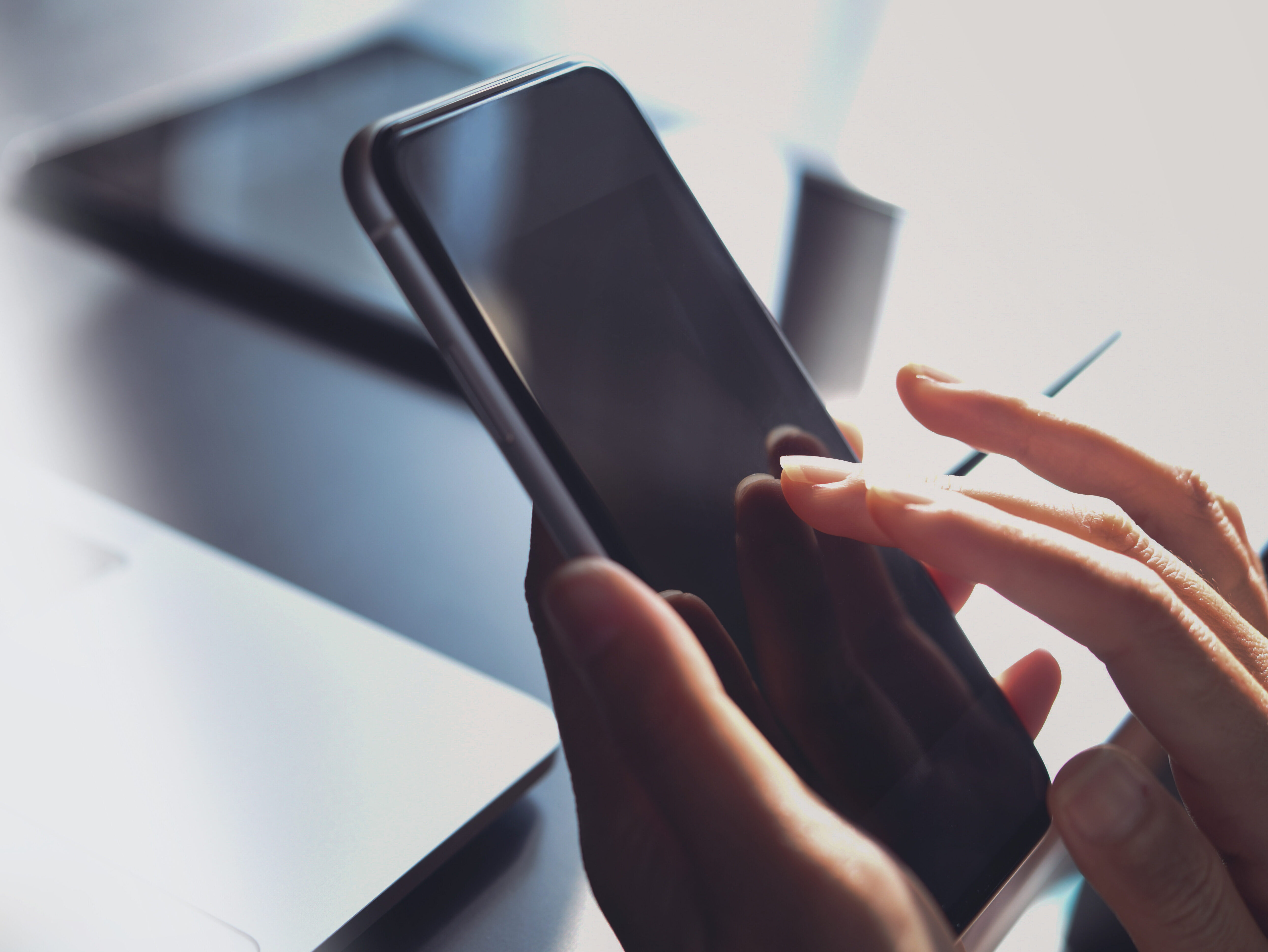 Close-up, business woman using smartphone, touching on screen, s